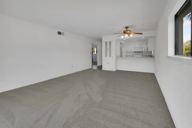 a view of empty room with a window