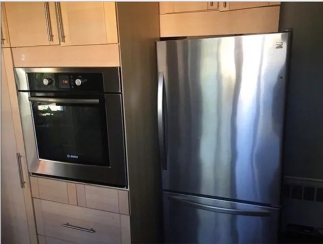 a close view of a refrigerator in kitchen