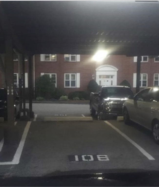 136 Boylston Street, Unit 1 Newton, MA 02467 - Photo 21 of 21 a front view of a house with a yard