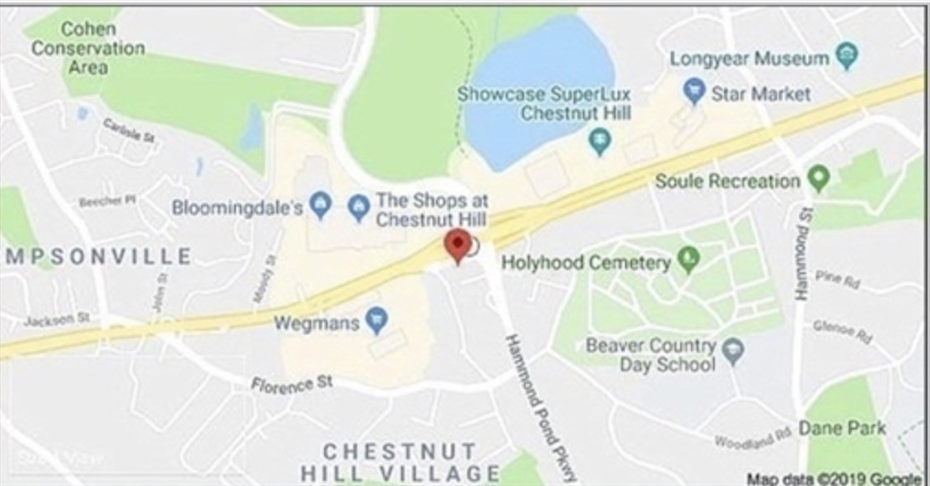 136 Boylston Street, Unit 1 Newton, MA 02467 - Photo 3 of 21 a picture of a book and a bed