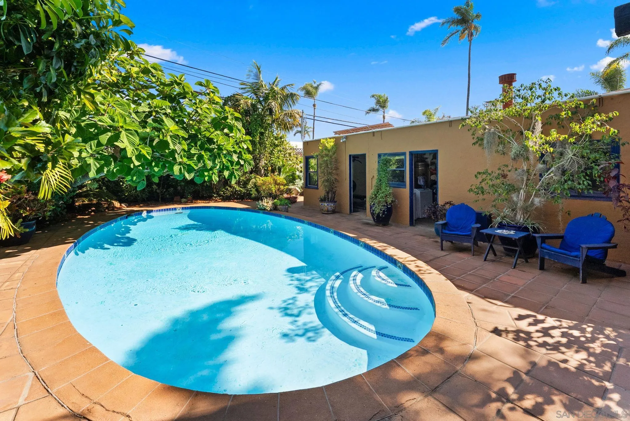 4965 Marlborough Drive San Diego, CA 92116 - Photo 44 of 47 a view of a swimming pool with seating space