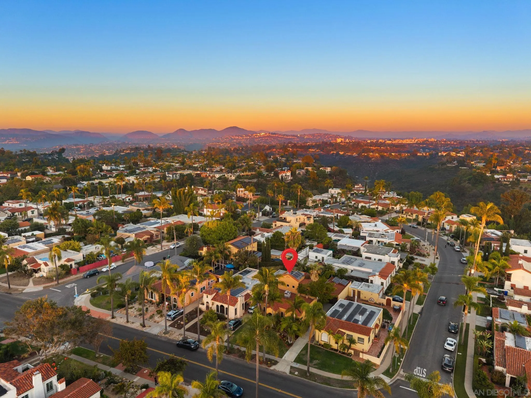 4965 Marlborough Drive San Diego, CA 92116 - Photo 45 of 47 a view of a city with sunset view