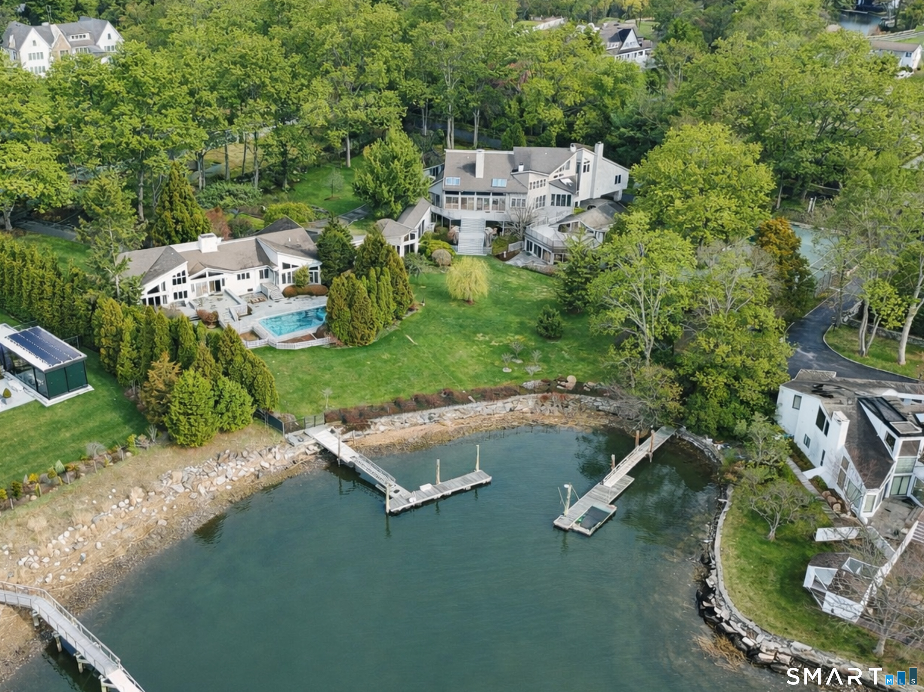 2 Judy Point Lane Westport, CT 06880 - Photo 2 of 27 an aerial view of a house with a yard basket ball court and outdoor seating