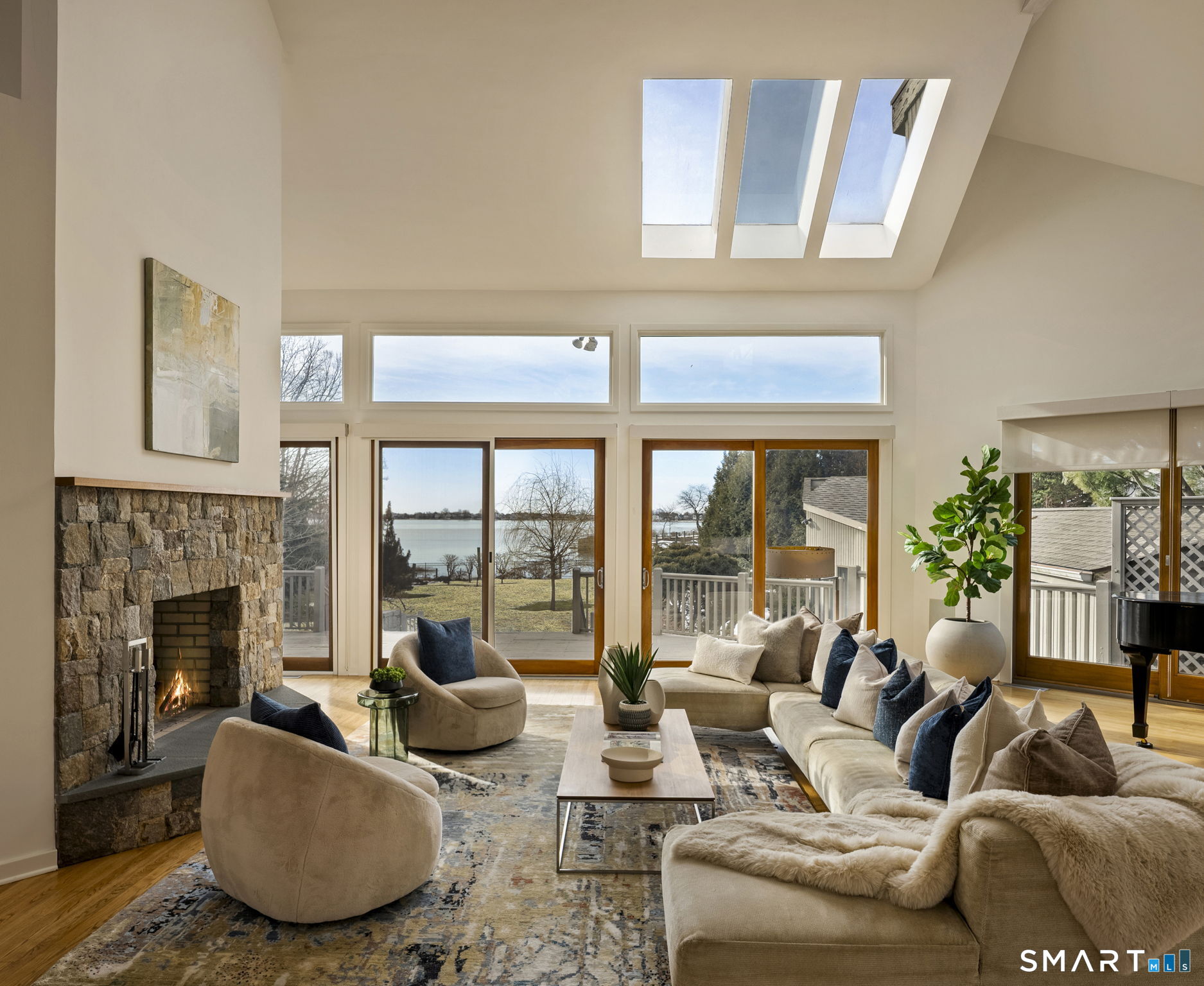 2 Judy Point Lane Westport, CT 06880 - Photo 3 of 27 a living room with furniture and a fireplace
