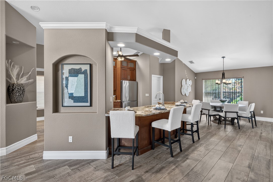 7407 Cobb Road Bokeelia, FL 33922 - Photo 11 of 41 a view of a livingroom with furniture and window