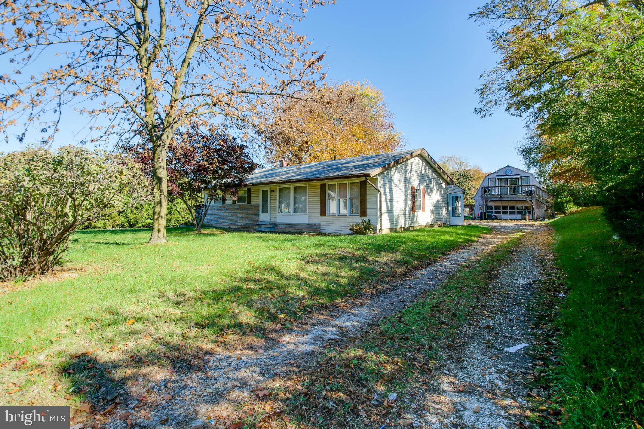 8183 Hog Neck Road Pasadena, MD 21122 - Photo 3 of 29 a view of house with backyard