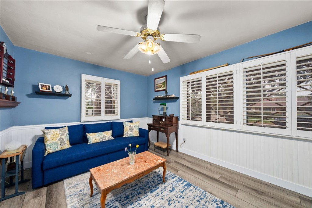 5180 Stonewood Drive Riverside, CA 92506 - Photo 12 of 31 a living room with furniture and a window