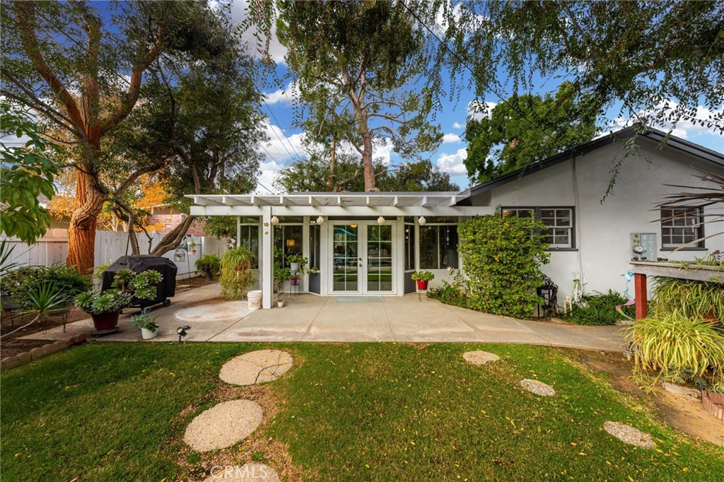 5180 Stonewood Drive Riverside, CA 92506 - Photo 26 of 31 a house view with a garden space