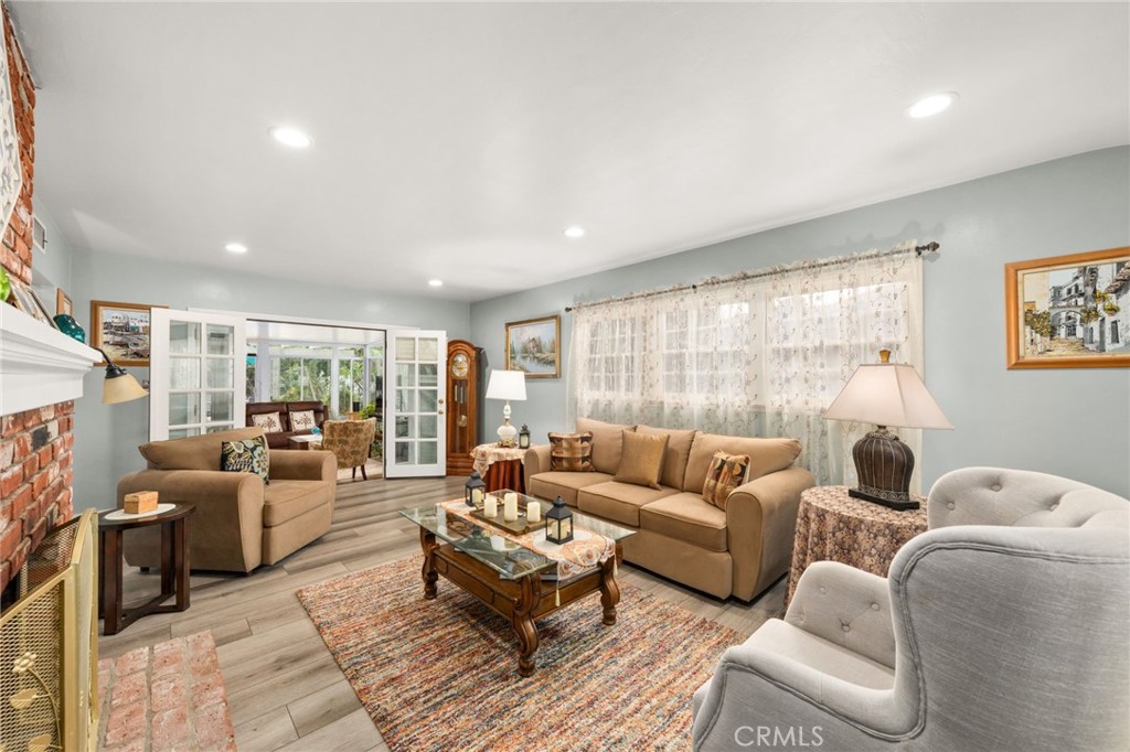 5180 Stonewood Drive Riverside, CA 92506 - Photo 5 of 31 a living room with furniture and a large window