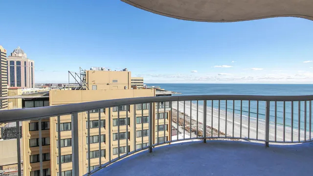 a view of balcony with a ceiling fan