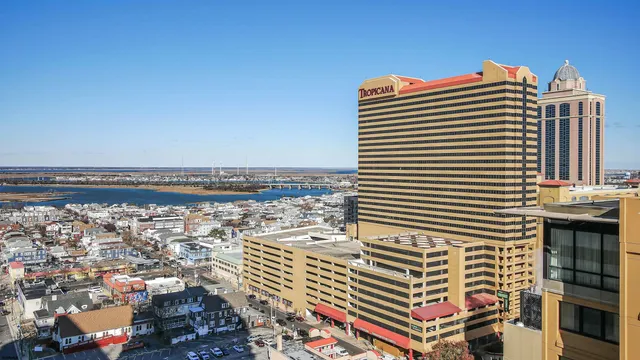 a bathroom with a toilet sink and shower