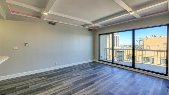 a view of an empty room with a window