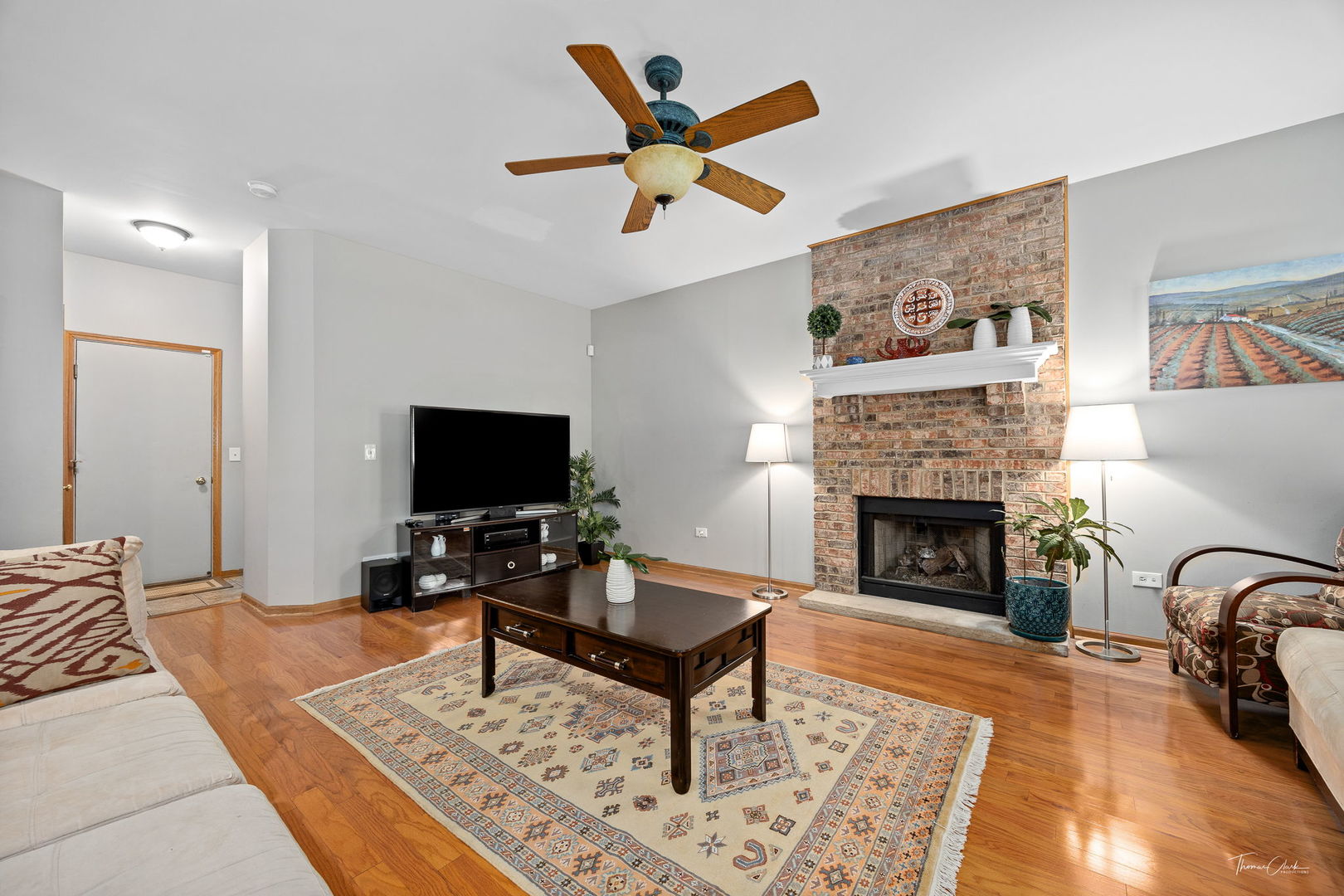1913 Apple Valley Road Bolingbrook, IL 60490 - Photo 3 of 32 a living room with furniture and a fireplace