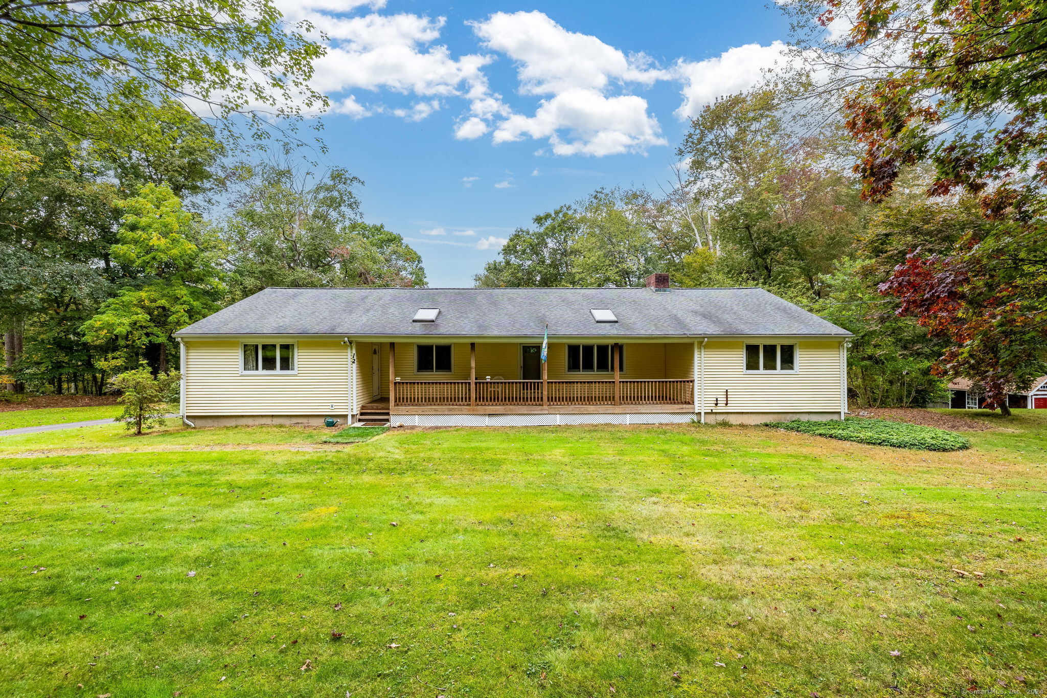 12 Jackson Drive Monroe, CT 06468 - Photo 1 of 1 a front view of a house with yard and green space
