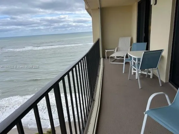 a view of balcony with seating space