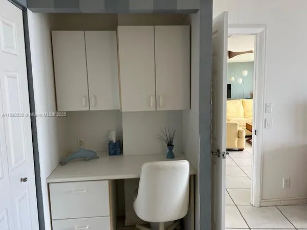 a bathroom with a sink a toilet and vanity