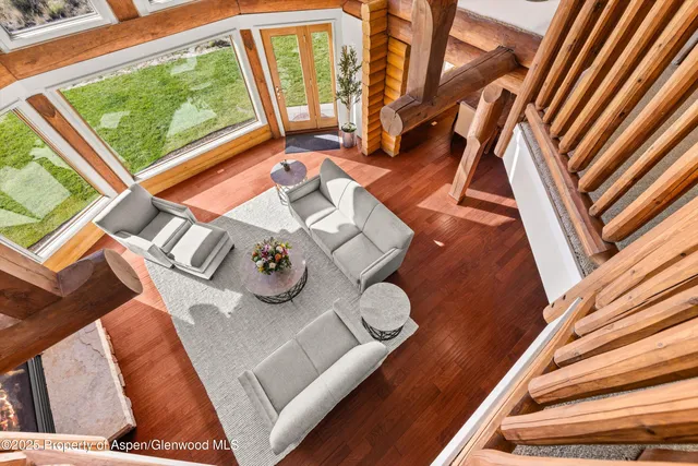 a bathroom with a granite countertop sink mirror and a bathtub