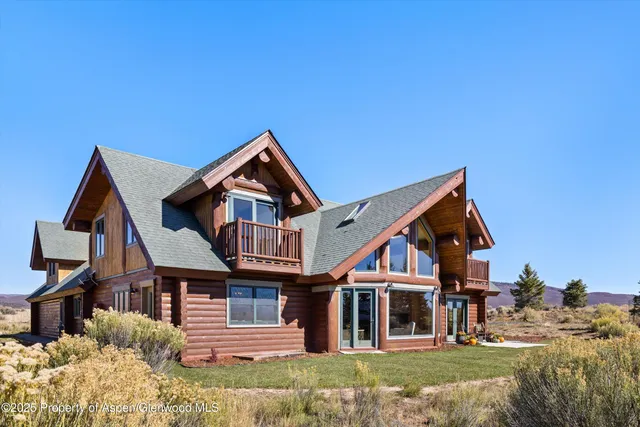front view of a house with a small yard