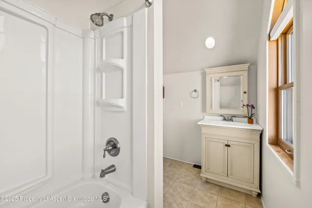 a view of a ocean with a mountain