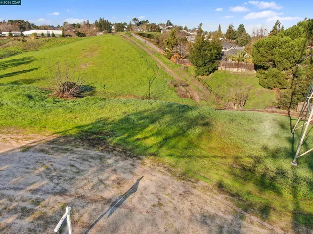 a view of a large body of water with a building in the background