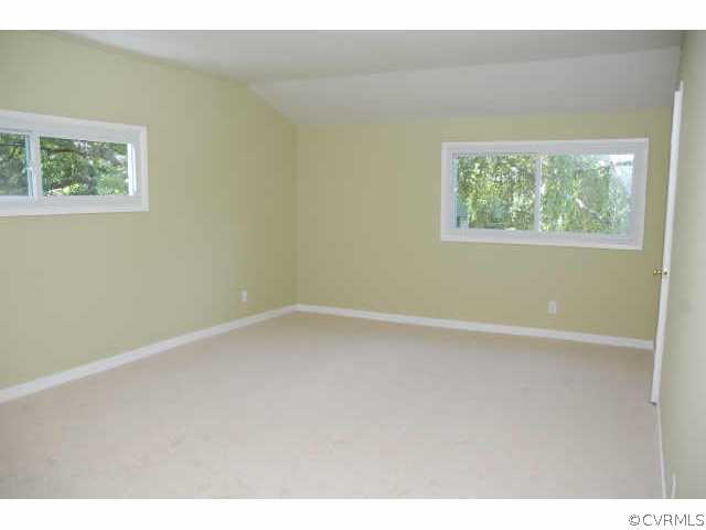 1321 Andover Road Richmond, VA 23229 - Photo 8 of 10 a view of an empty room with a window
