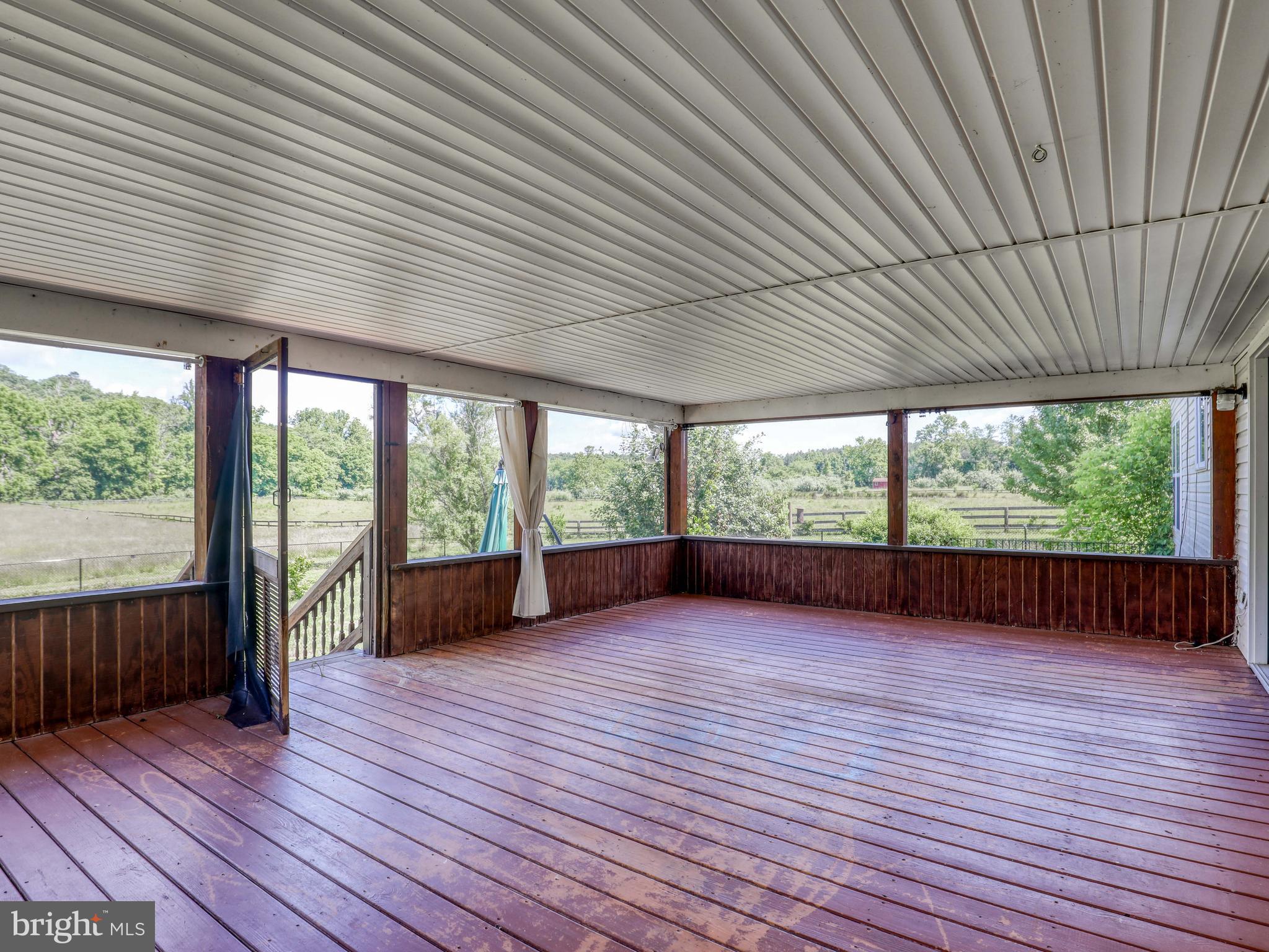 2812 Hunting Ridge Road Winchester, VA 22603 - Photo 6 of 56 HUGE Screened Porch