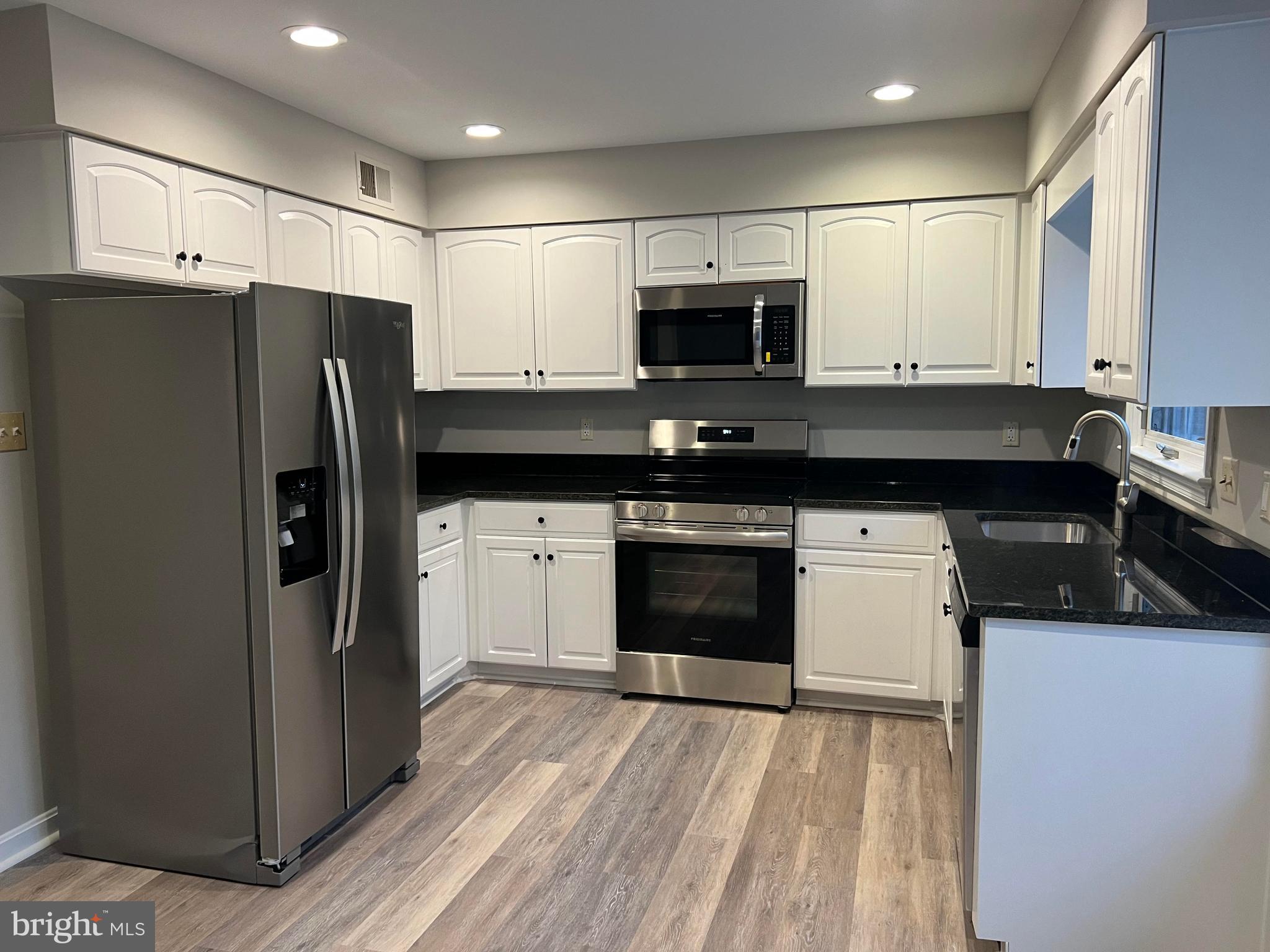 8720 Evangel Drive Springfield, VA 22153 - Photo 54 of 77 Updated kitchen w/granite and brand new appliances