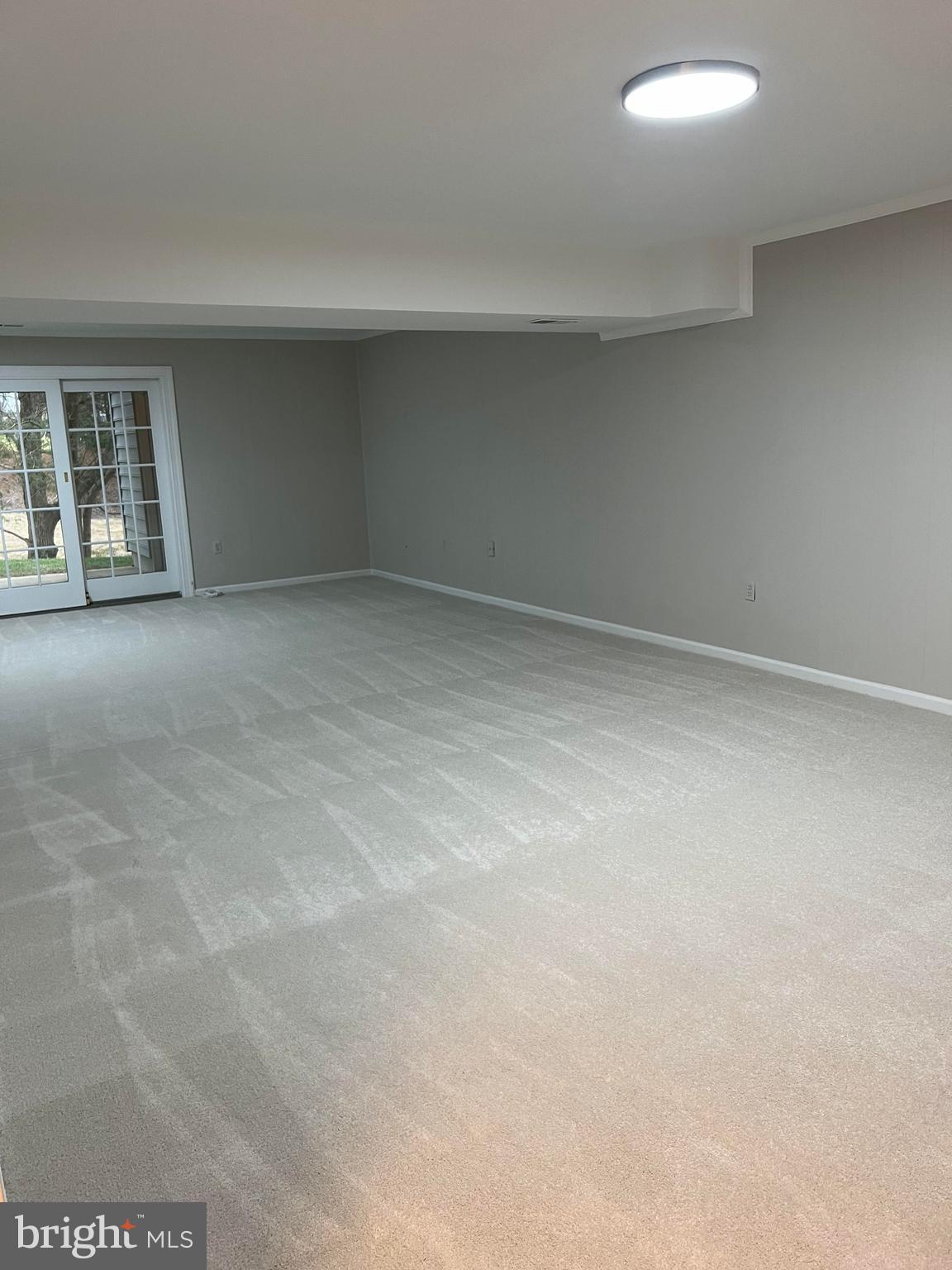 8720 Evangel Drive Springfield, VA 22153 - Photo 66 of 77 Basement Recroom w/french doors to backyard patio