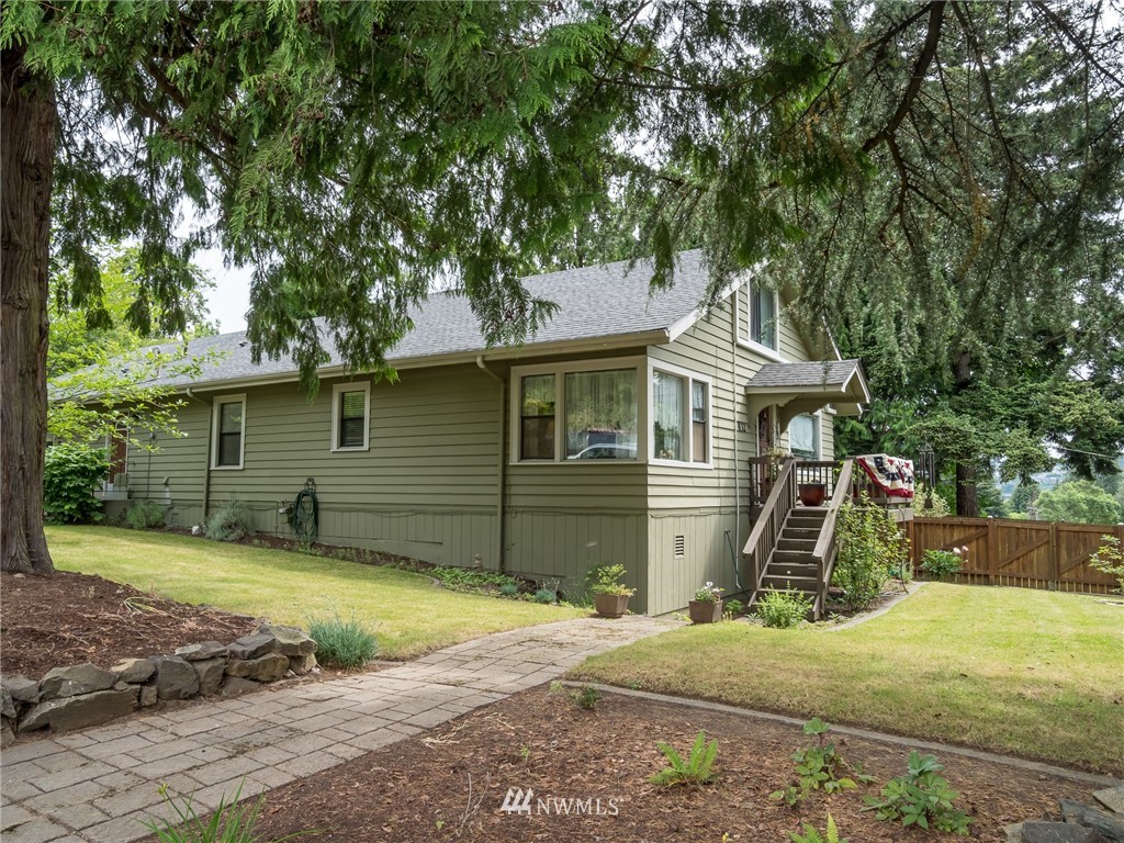 832 Southwest 4th Place Renton, WA 98057 - Photo 1 of 25 a view of a house with a yard