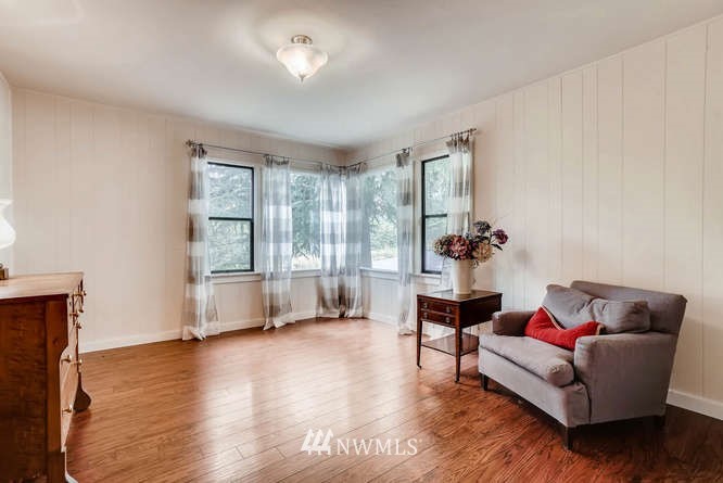 832 Southwest 4th Place Renton, WA 98057 - Photo 11 of 25 a living room with furniture and wooden floor