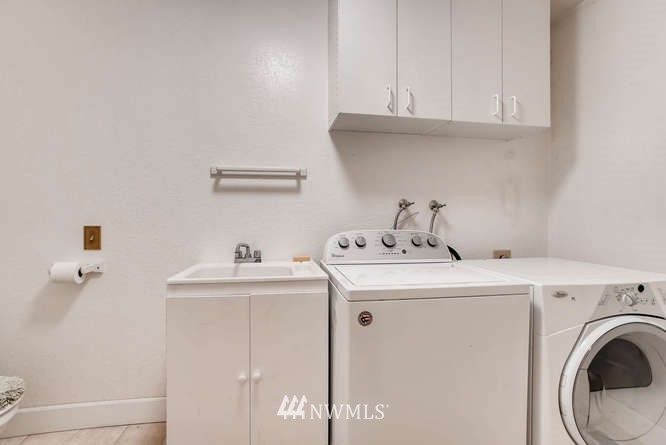 832 Southwest 4th Place Renton, WA 98057 - Photo 16 of 25 a utility room with dryer and washer