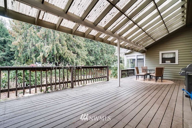 832 Southwest 4th Place Renton, WA 98057 - Photo 18 of 25 a view of backyard with a deck and wooden floor