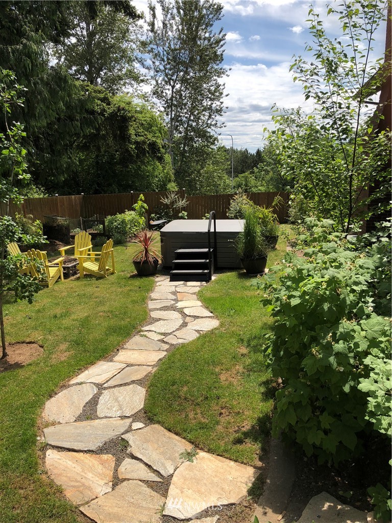 832 Southwest 4th Place Renton, WA 98057 - Photo 22 of 25 a view of a backyard with sitting area