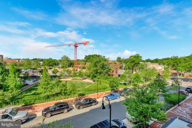a kitchen with refrigerator and stove