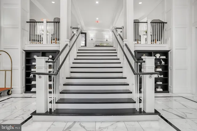 a swimming pool with outdoor seating and yard