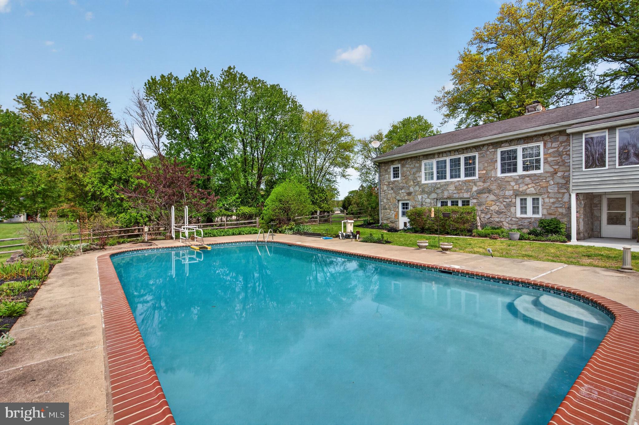 300 Sanatoga Road Pottstown, PA 19465 - Photo 12 of 79 Serene backyard oasis with pool.