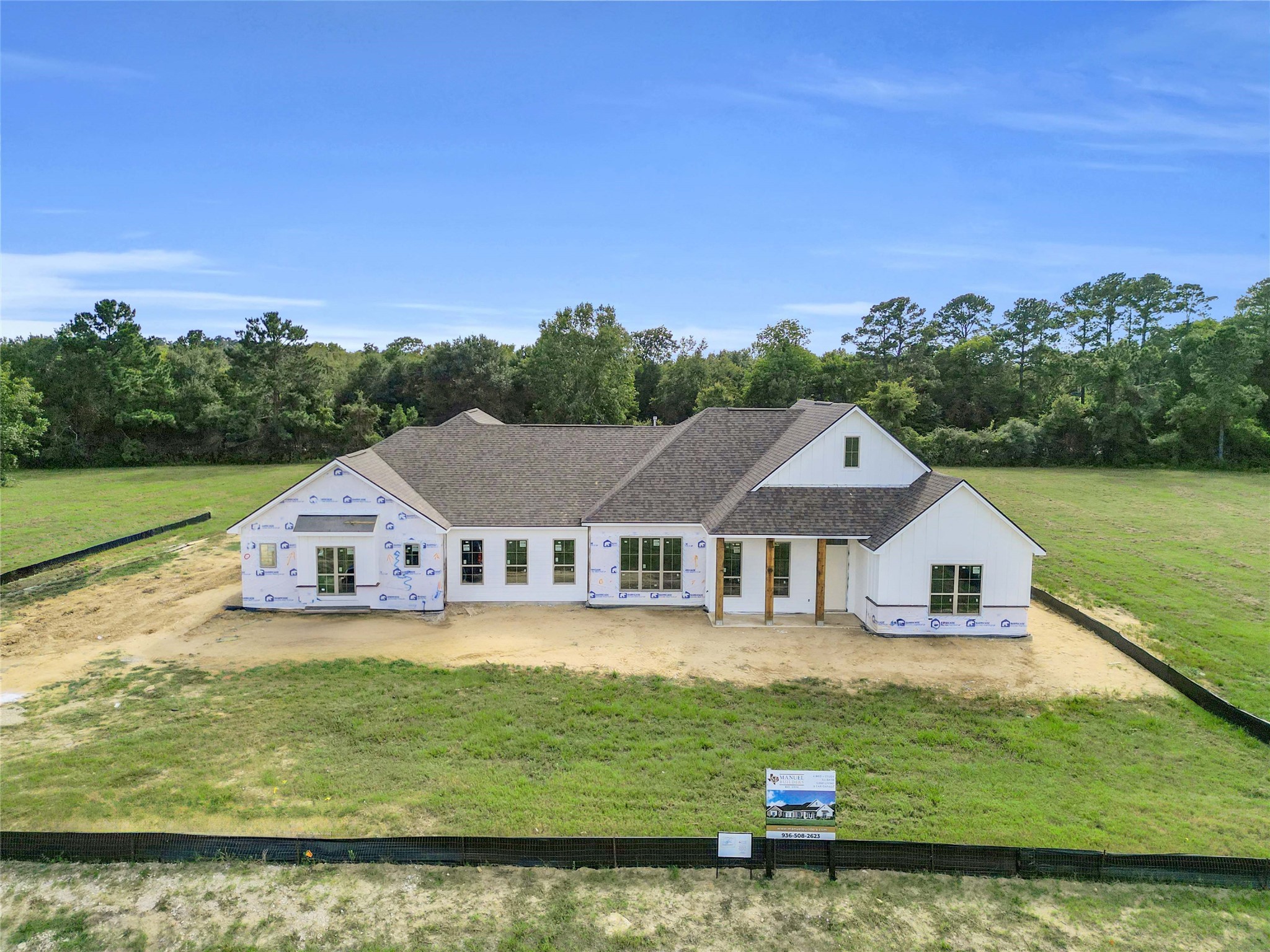 24951 Hopeview Way Montgomery, TX 77356 - Photo 4 of 8 a house that is sitting in the middle of a lake with houses