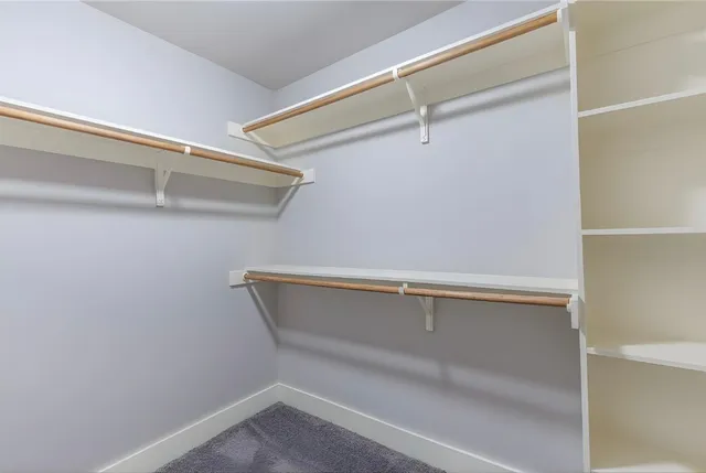 a view of an empty walk in closet