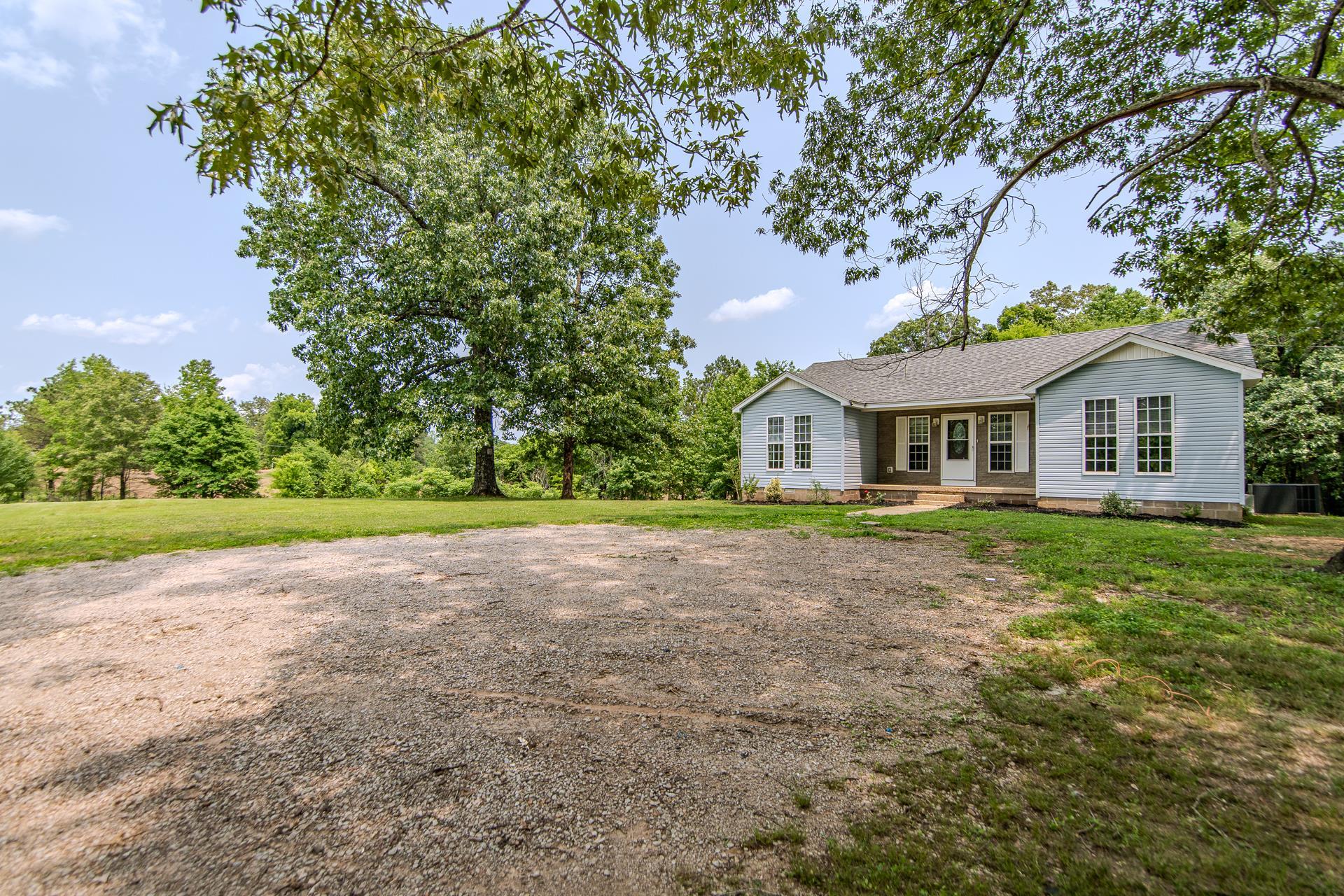 1633 Hardin Graveyard Road Adamsville, TN 38310 - Photo 29 of 33 a front view of house with yard and green space