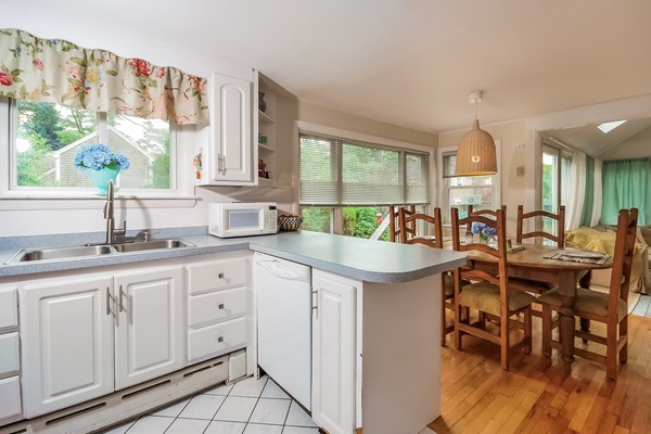 201 Converse Road Marion, MA 02738 - Photo 6 of 17 a kitchen with center island table and chairs