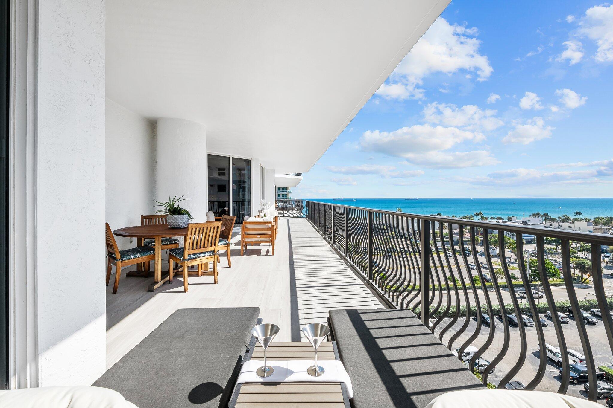 100 South Birch Road, Unit 1004 Fort Lauderdale, FL 33316 - Photo 11 of 39 a view of a balcony with chairs