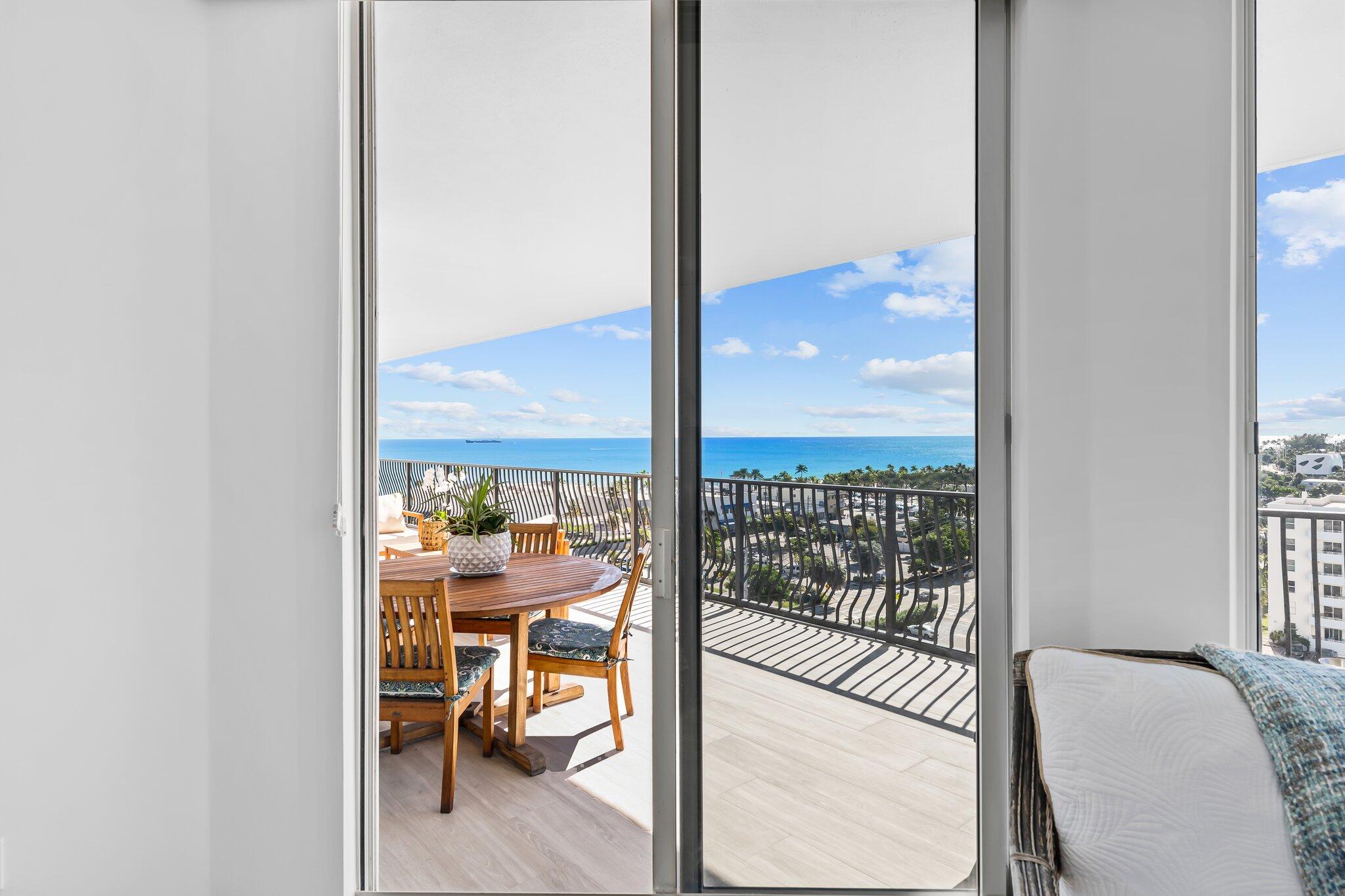 100 South Birch Road, Unit 1004 Fort Lauderdale, FL 33316 - Photo 13 of 39 a view of a room with a large window and chair