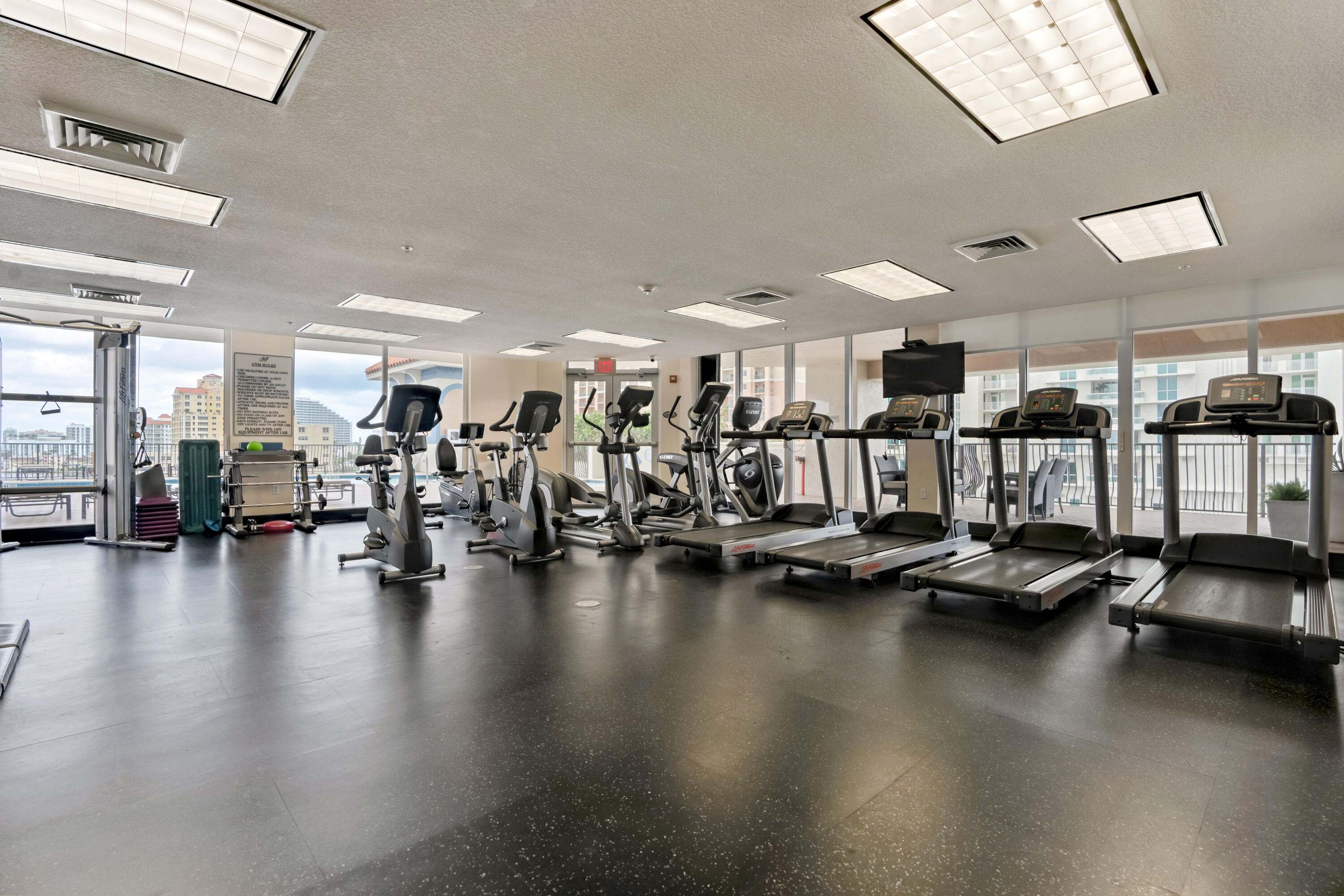 100 South Birch Road, Unit 1004 Fort Lauderdale, FL 33316 - Photo 37 of 39 a view of a room with gym equipment