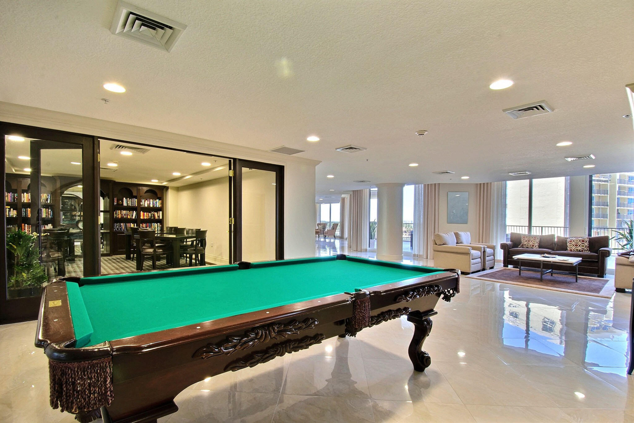 100 South Birch Road, Unit 1004 Fort Lauderdale, FL 33316 - Photo 38 of 39 a room with pool table and windows