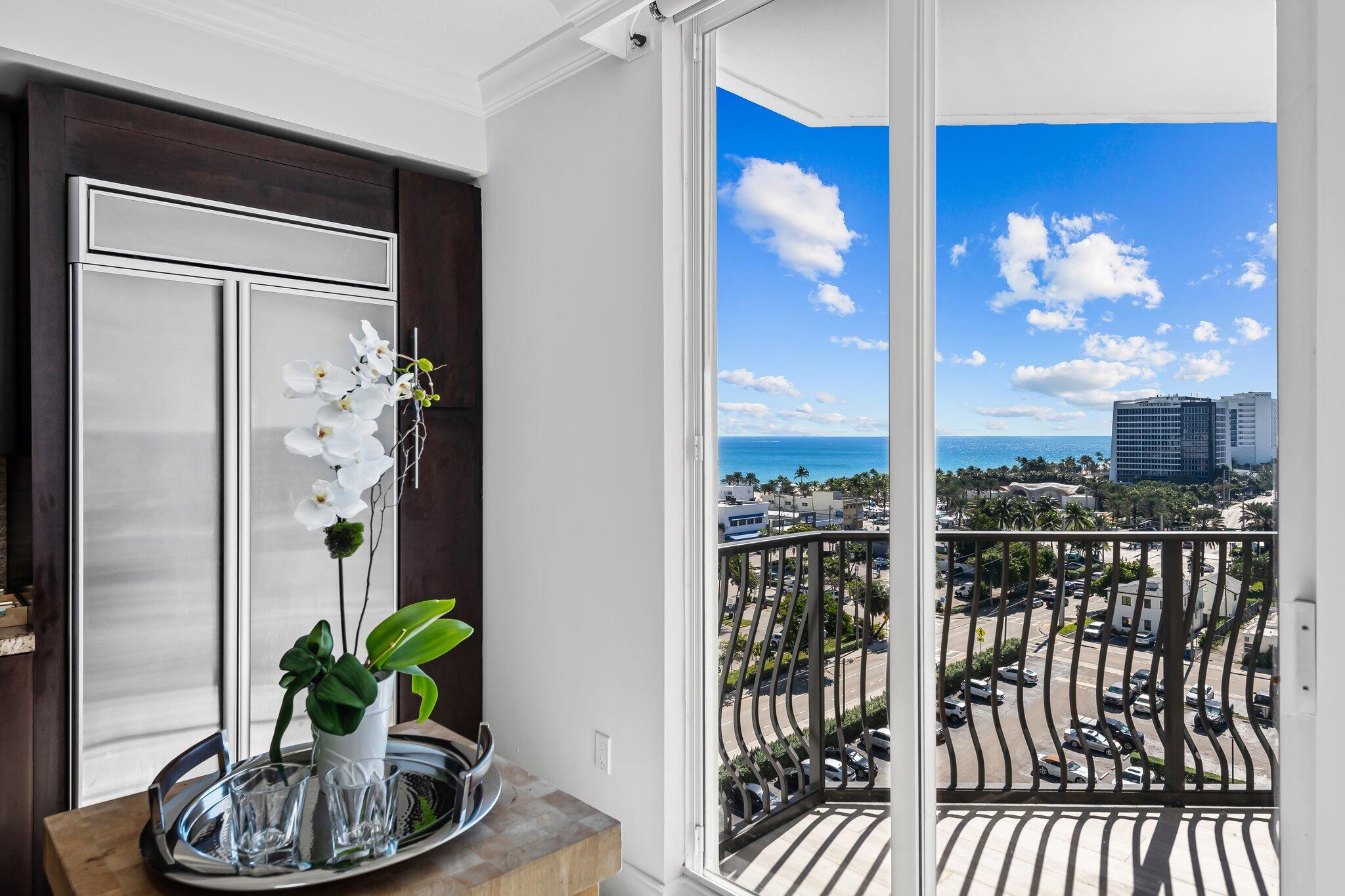 100 South Birch Road, Unit 1004 Fort Lauderdale, FL 33316 - Photo 5 of 39 a balcony with furniture and potted plant