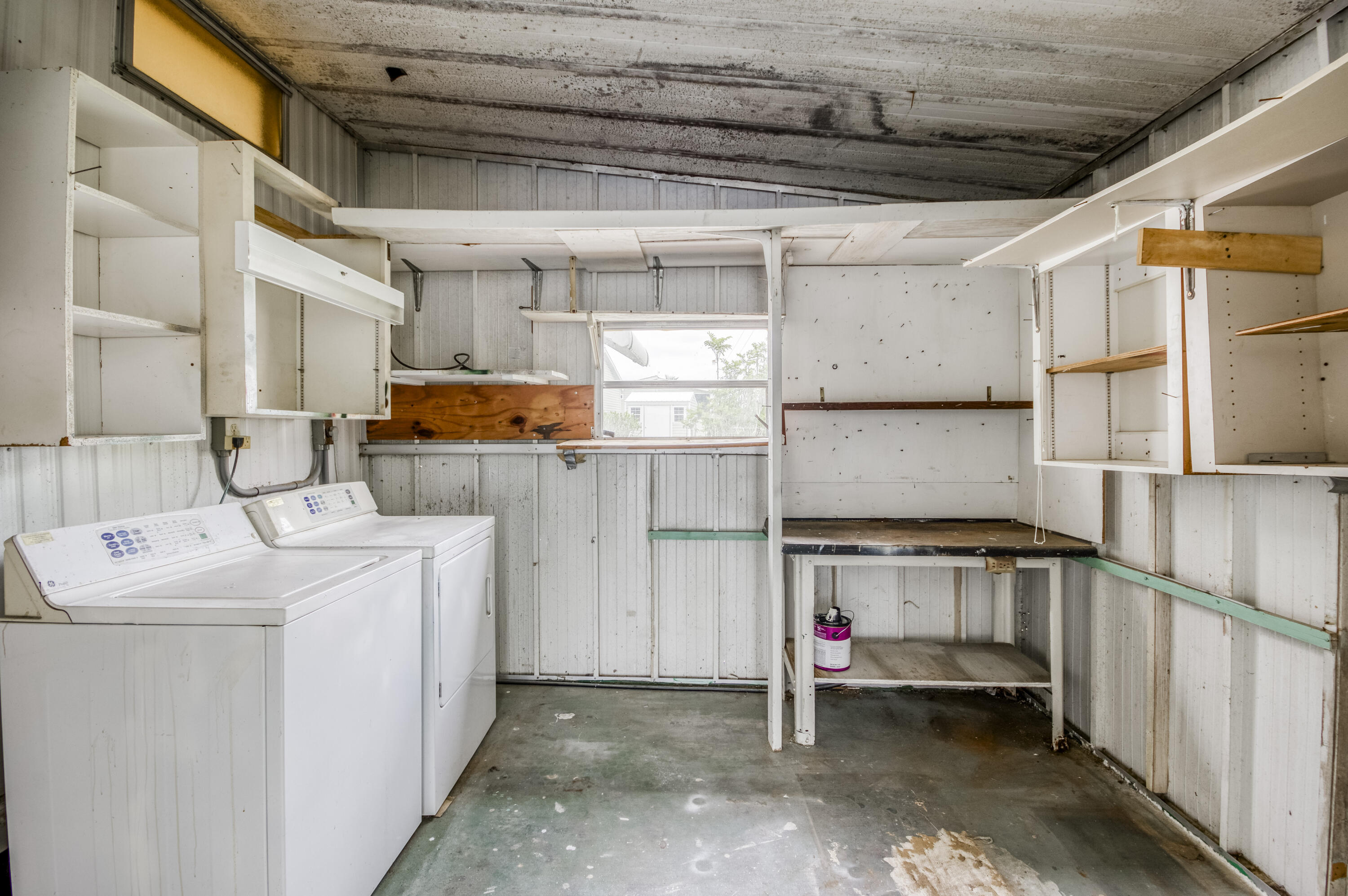 4800 Southeast Federal Highway, Unit 17 Stuart, FL 34997 - Photo 19 of 29 a utility room with dryer and washer