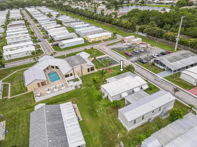 an aerial view of a house with a garden