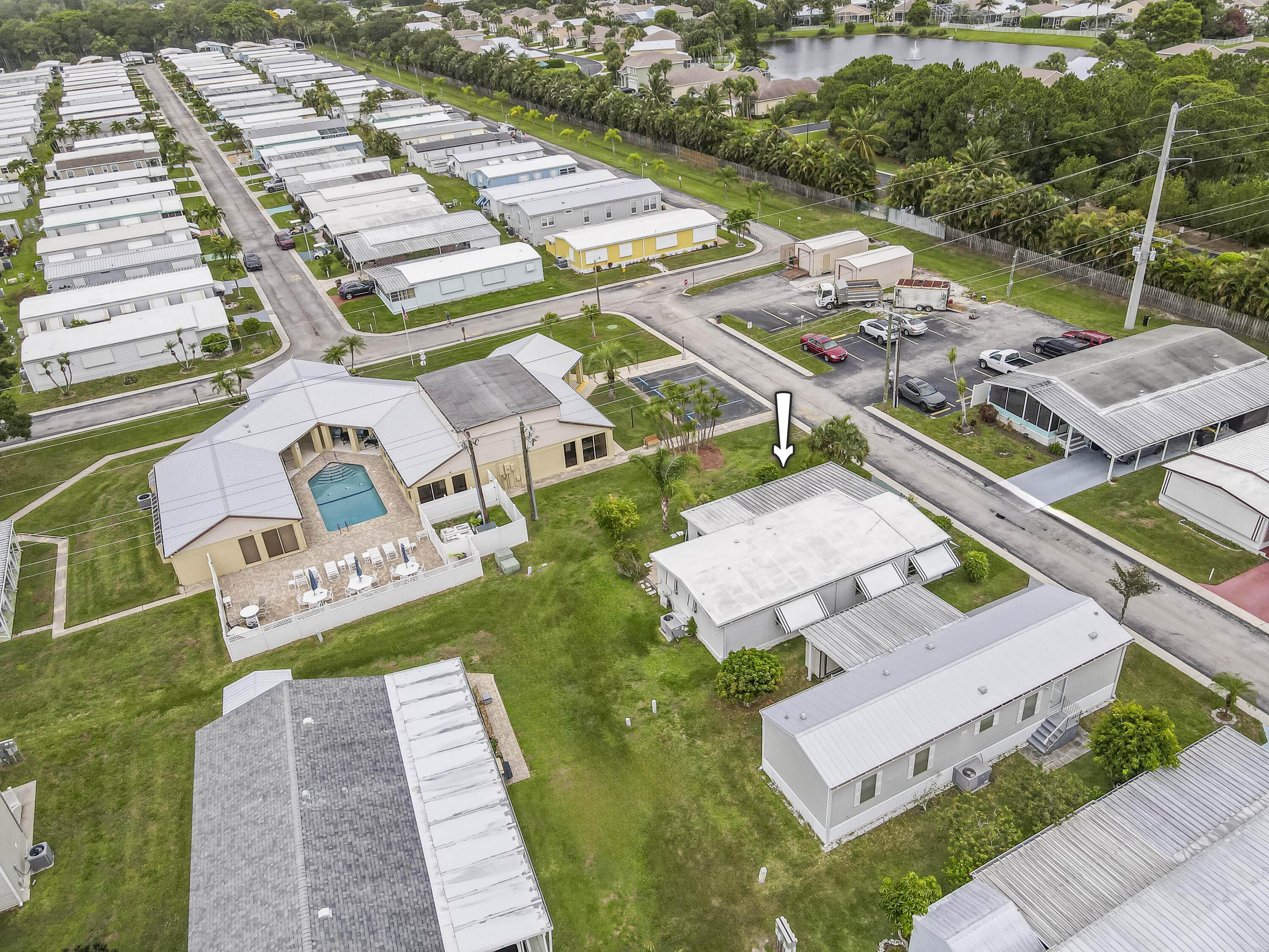 4800 Southeast Federal Highway, Unit 17 Stuart, FL 34997 - Photo 21 of 29 an aerial view of a house with a garden