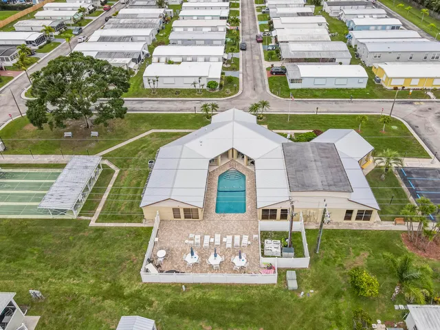 an aerial view of a house with a garden