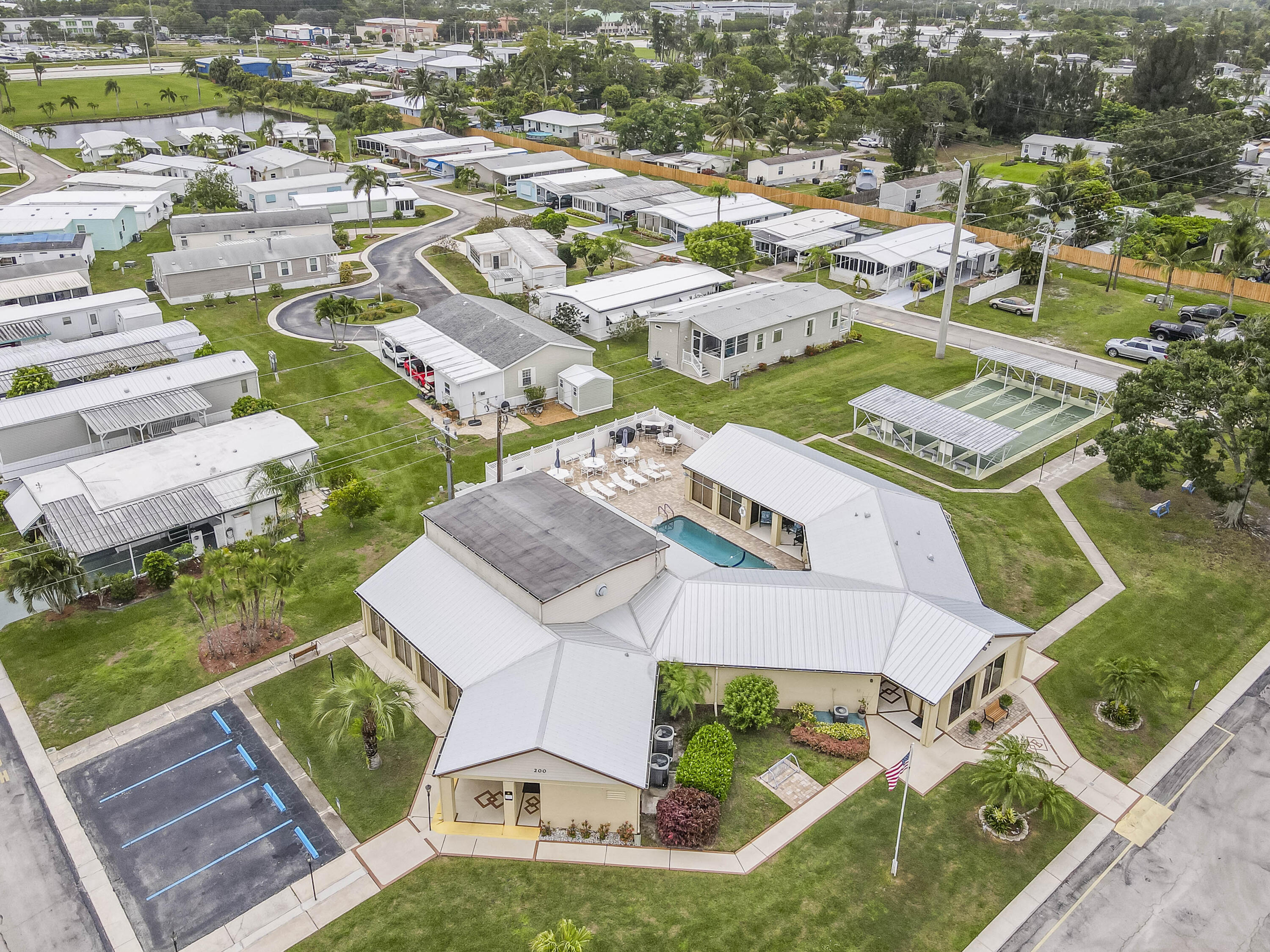 4800 Southeast Federal Highway, Unit 17 Stuart, FL 34997 - Photo 23 of 29 an aerial view of residential houses with outdoor space and street view